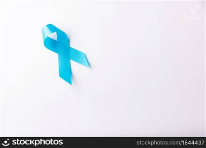 November light blue ribbon, studio shot isolated on white background, Prostate cancer awareness month, men&rsquo;s health concept