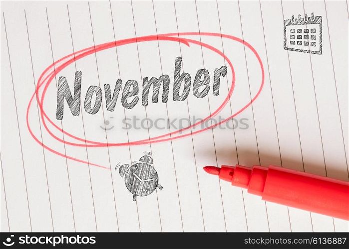 November note with sketches and a red marker