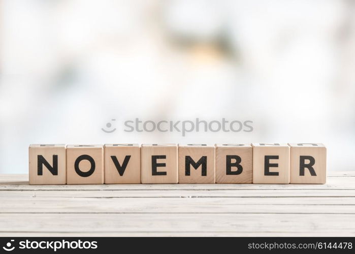 November sign with wooden blocks on a table