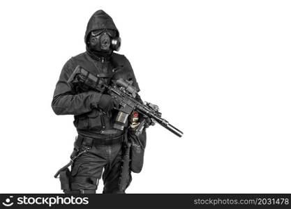 Nuclear post apocalypse. Studio shot of survivor with weapons and gas mask. Studio shot nuclear survivor with weapons