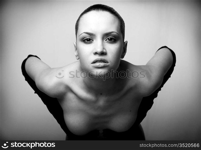 nude elegant girl with the gloves. Studio fashion photo.