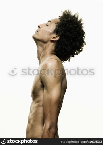 Nude man with eyes closed