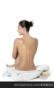 Nude sit woman back with white towel studio shot