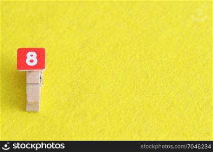 Number 8 displayed on a yellow background