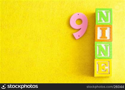 Number 9 displayed as a word and a number
