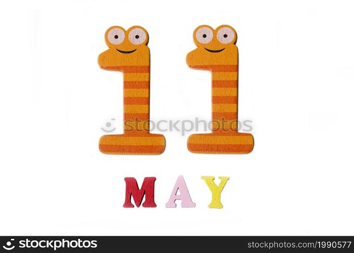 Number eleven and the word may on a white background. Calendar.. Number eleven and the word may on a white background.