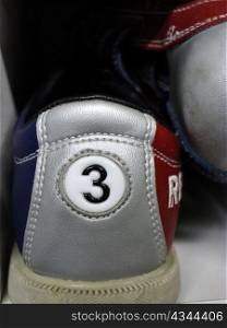 Number three on a bowling shoe.