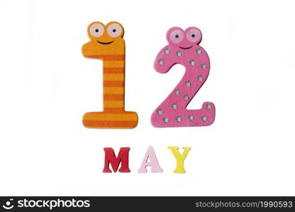 Number twelve and the word may on a white background. Calendar.. Number twelve and the word may on a white background.