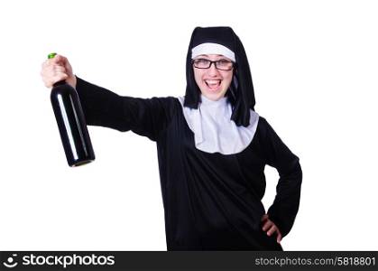 Nun with bottle of wine on white