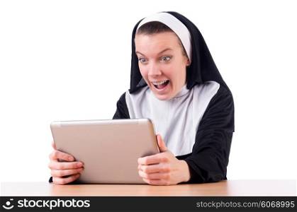 Nun working on laptop - religious concept