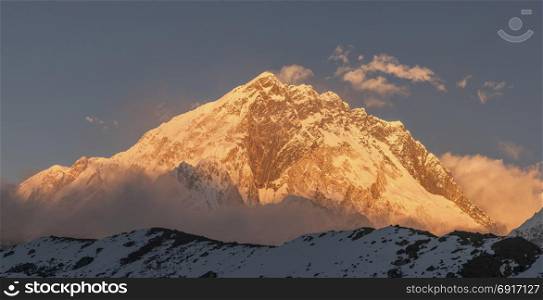 Nuptse summit or peak at sunset or sunrise. Everest base camp trek, tourism in Nepal
