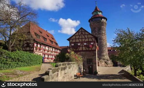 Nuremberg Castle (Sinwell tower) with blue sky and clouds timelapse, Germany