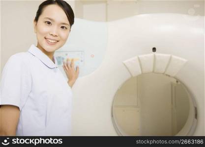 Nurse and a CT machine