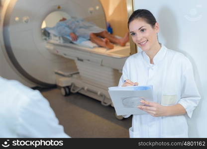 Nurse at entrance to scanning room