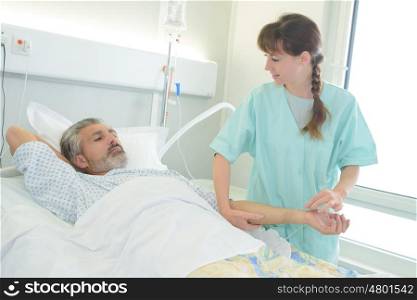 nurse checking on a patients