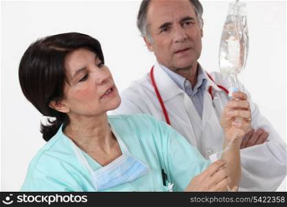 Nurse checking perfusion