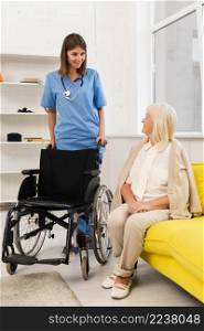 nurse getting wheelchair old woman