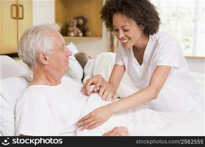 Nurse Helping Senior Man