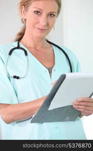 Nurse holding file