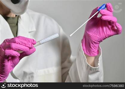 Nurse Holds A Swab For The Coronavirus / Covid19 Test