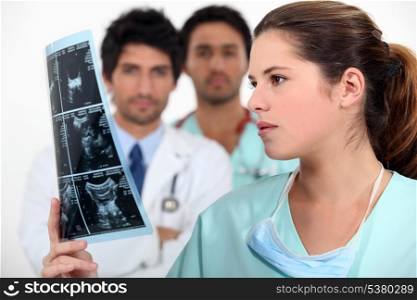 Nurse looking at ultrascan