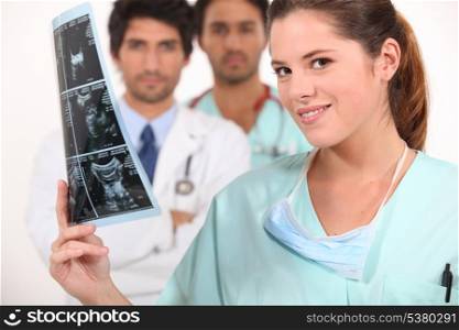 Nurse looking at ultrasound