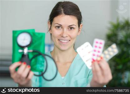 nurse showing pills to camera