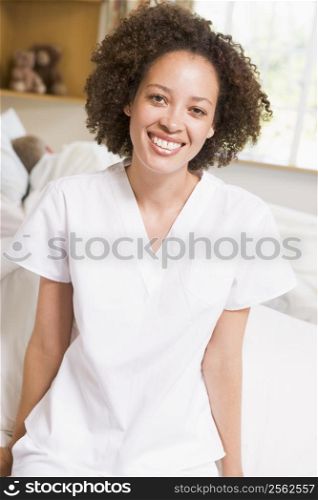 Nurse Sitting On Hospital Bed