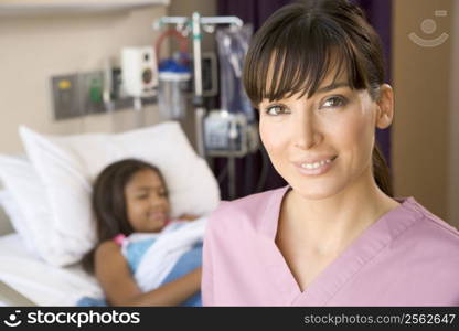 Nurse Standing In Hospital Room