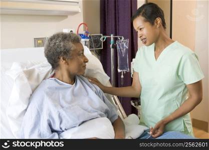 Nurse Talking To Senior Woman