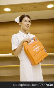 Nurse with an AED