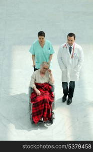 Nurse with patient in wheelchair