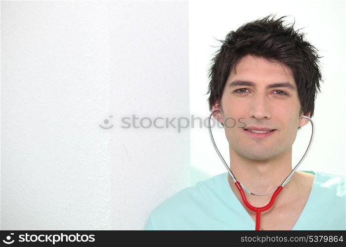 Nurse with stethoscope placed