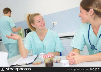 nurses coworkers at a coffee break