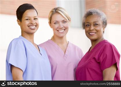 Nurses Standing Outside A Hospital