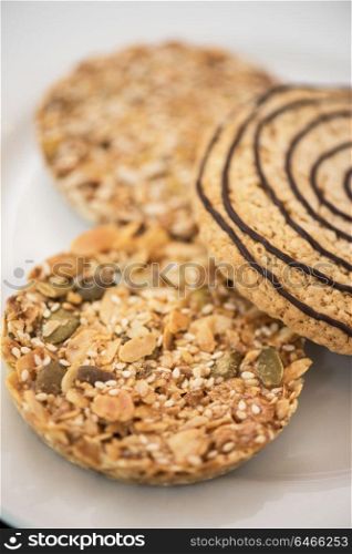 Nut cookies closeup. Nut cookies closeup on white plate