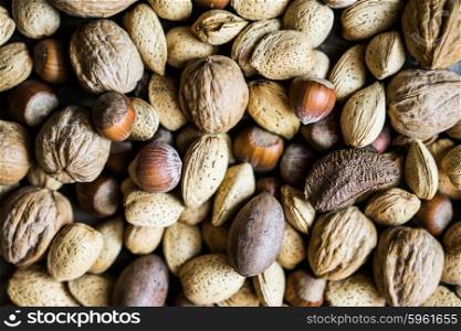 Nut mix on rustic wooden background