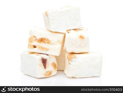 Nut nougat bar traditional sweet candy on white background