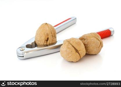 nutcracker with walnuts isolated with clipping path