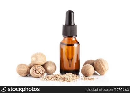 Nutmeg essential oil isolated on white background. Nutmeg oil for massage