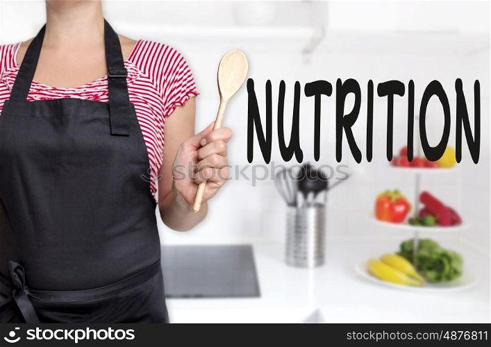nutrition cook holding wooden spoon concept background. nutrition cook holding wooden spoon concept background.
