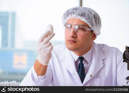 Nutrition expert testing food products in lab