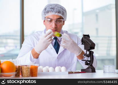 Nutrition expert testing food products in lab