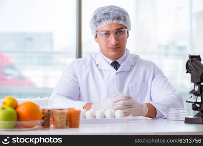 Nutrition expert testing food products in lab