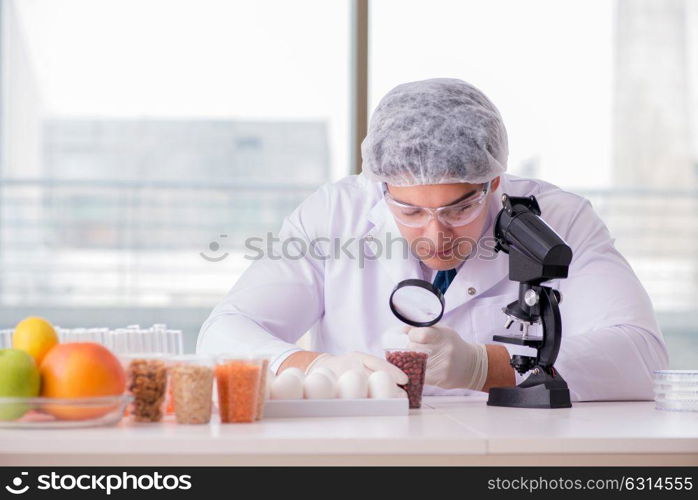 Nutrition expert testing food products in lab