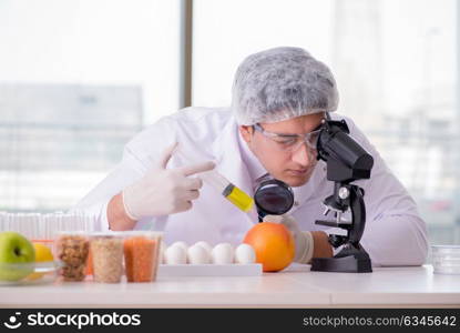 Nutrition expert testing food products in lab