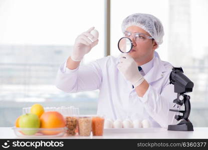 Nutrition expert testing food products in lab