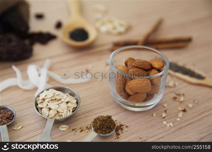 nuts almond on wood background