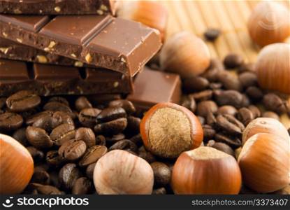 nuts and chocolate on a bamboo mat