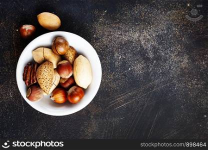 nuts in bowl, mix nuts in white bowl
